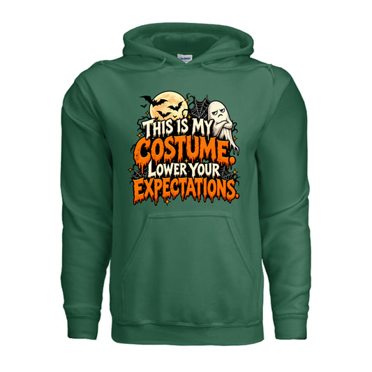 Fan Dark Green This Is My Costume Lower Your Expectations Halloween graphic with grumpy ghost, bats, glowing moon, spiderwebs, and orange and white lettering.