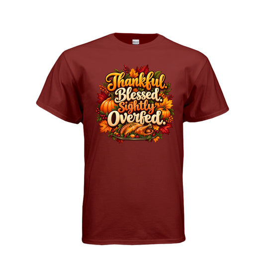 Thankful Blessed Slightly Overfed funny Thanksgiving T-shirt featuring roasted turkey, pumpkins, autumn leaves, berries, and fall lettering.