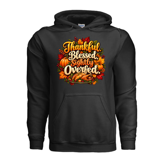 Thankful Blessed Slightly Overfed Thanksgiving hoodie with colorful fall lettering, roasted turkey, pumpkins, berries, and autumn leaves.