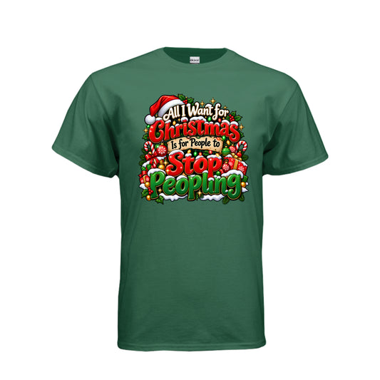 All I Want for Christmas Is for People to Stop Peopling funny T-shirt with bold red and green Christmas lettering, Santa hat, and holiday decorations.